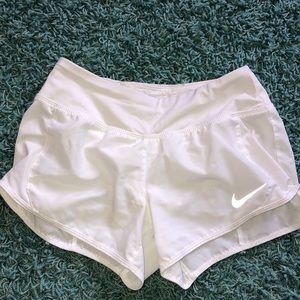 White nike running shorts